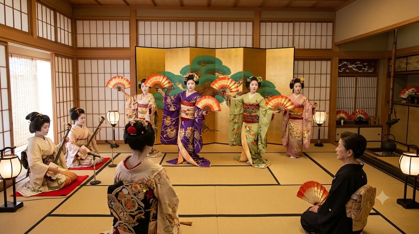 Japanese geisha and maiko perform a fan dance before a gold folding screen while others play the shamisen, in a tatami room.